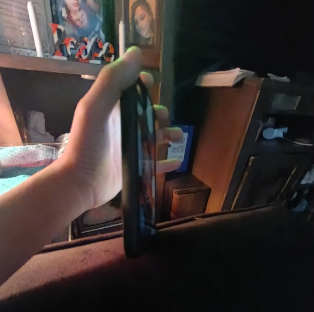 Apple Smartphone with Black Case